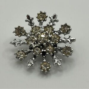 Elegant Silver Snowflake silver tone Brooch with stones